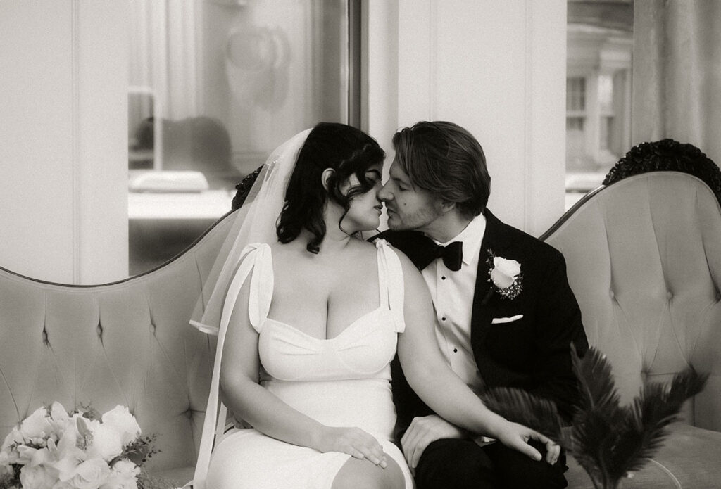 Bride and groom Walking in the Kimpton Hotel Monaco before their courthouse elopement.