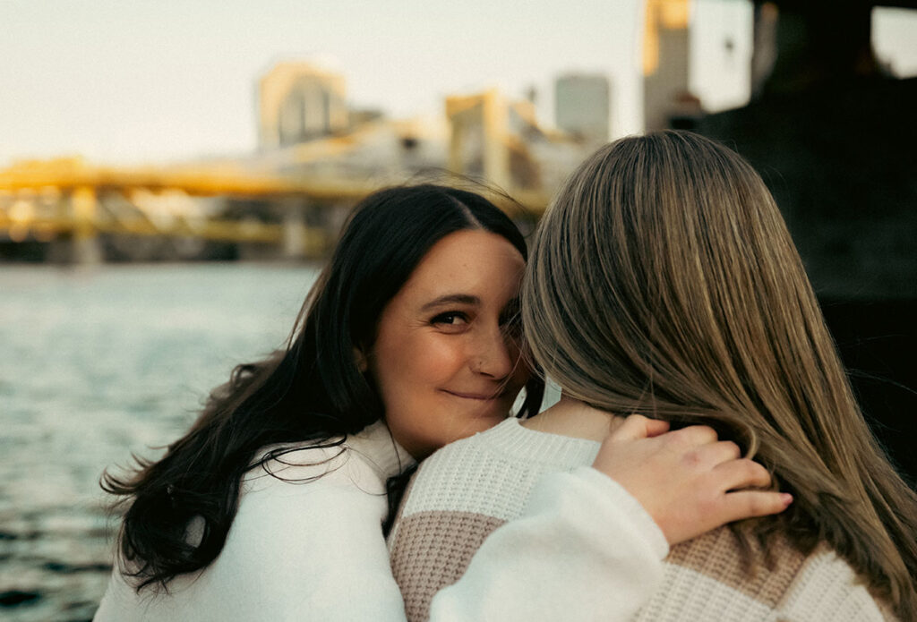 Engaged Couple Hanging our by the river in Downtown Pittsburgh