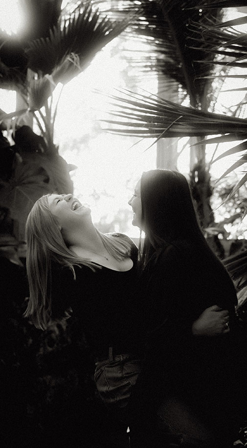 Couple Laugh at their Engagement Session at Phipps Conservatory in Pittsburgh