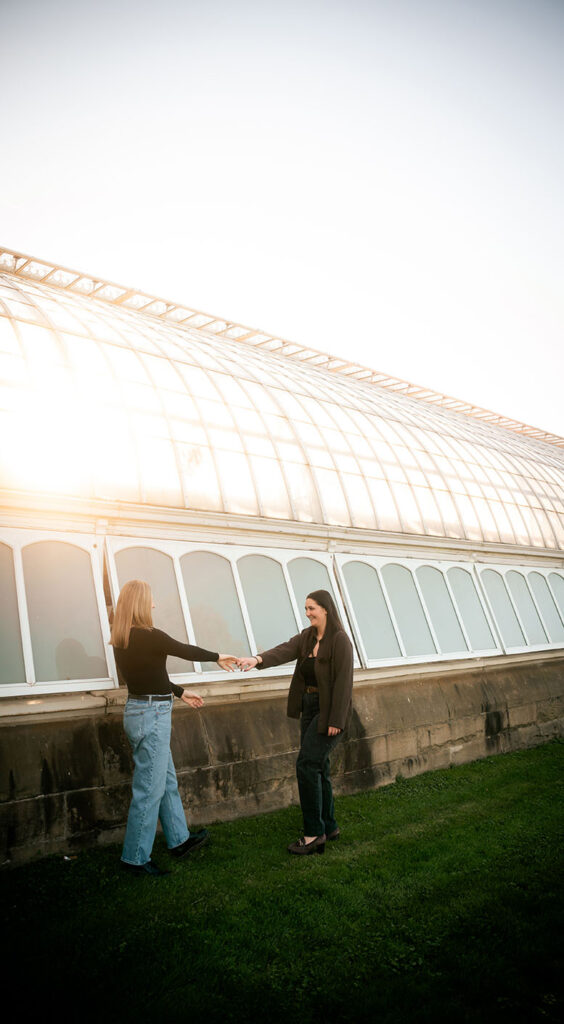 Couple Laugh at their Engagement Session at Phipps Conservatory in Pittsburgh