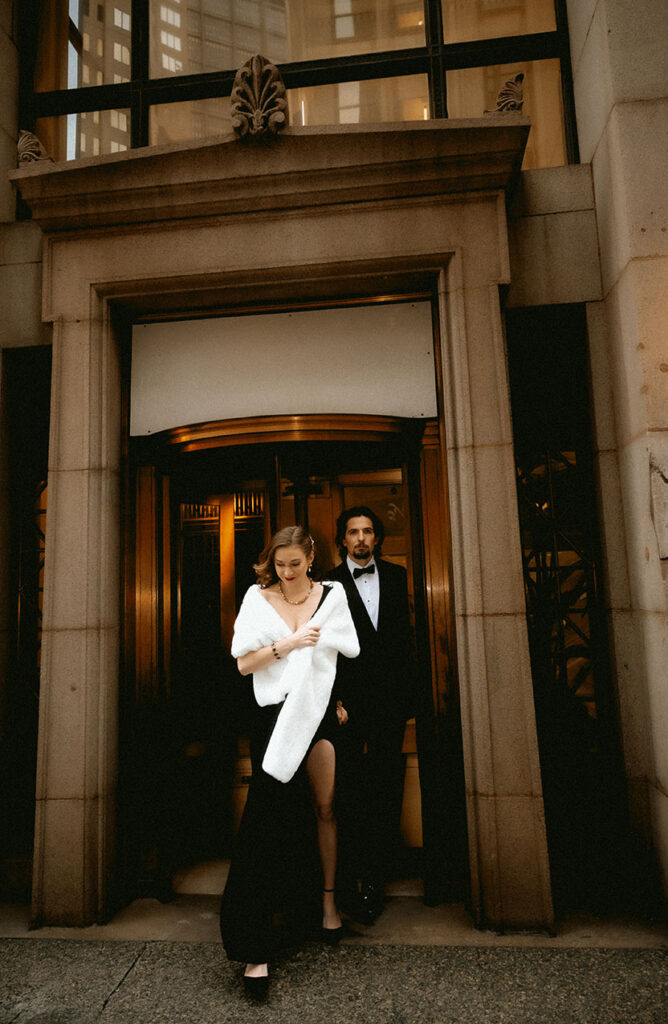 Romantic couple walking through Downtown Pittsburgh during an intimate wedding day