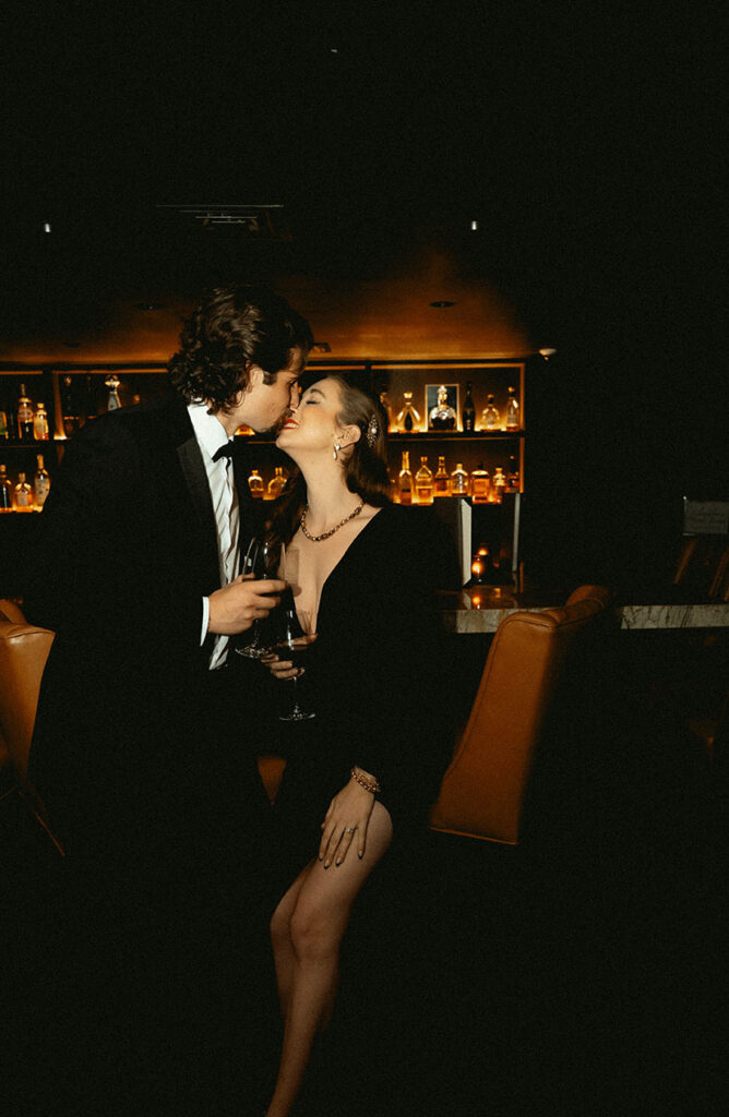 Couple celebrating their wedding with cocktails overlooking Downtown Pittsburgh