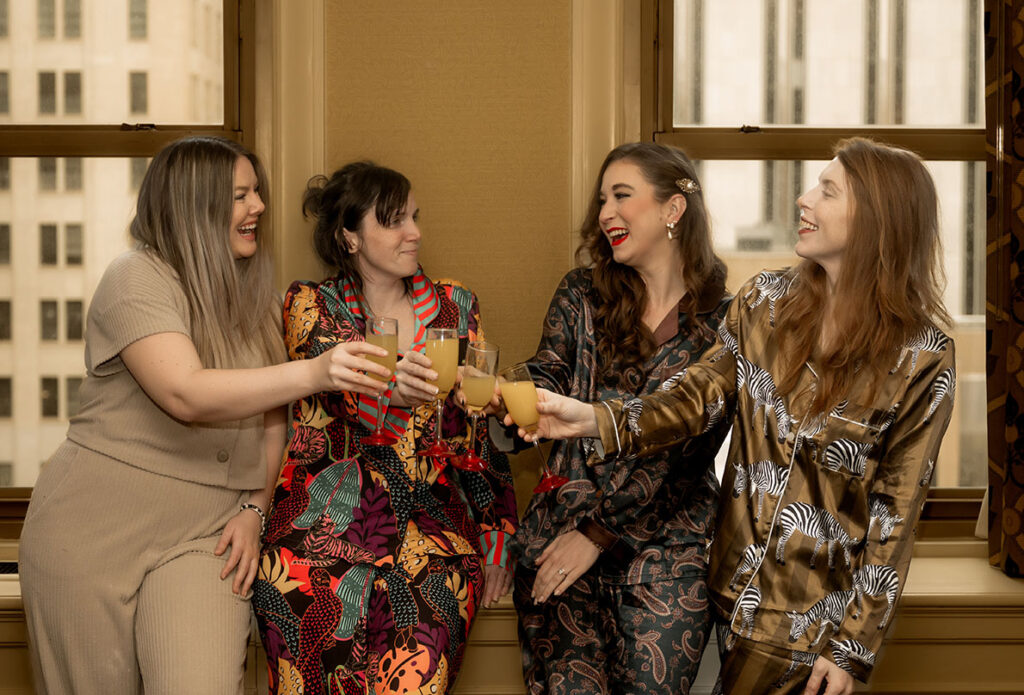 Bride with best friends preparing for a courthouse wedding in Pittsburgh