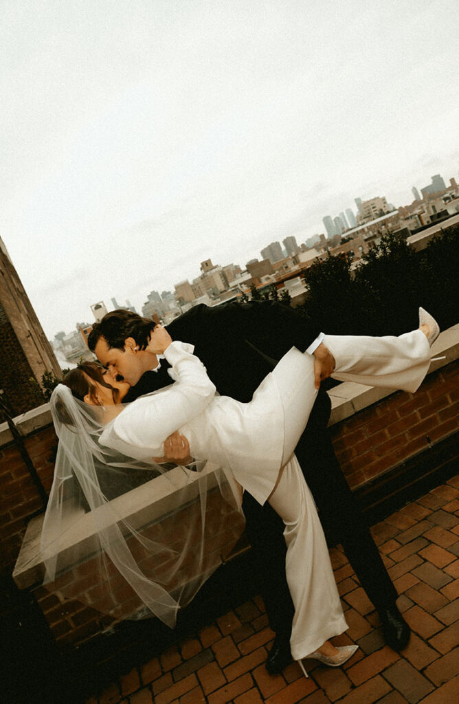 Editorial elopement portraits with NYC skyline in the background