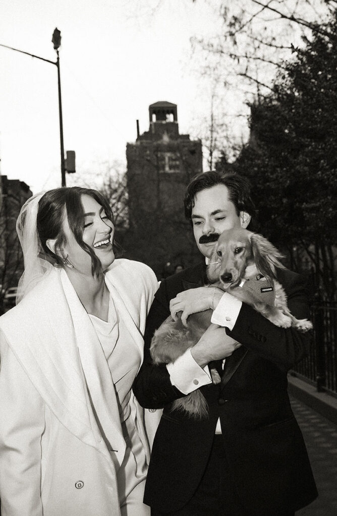 Cinematic elopement photos in NYC with dog using natural light and urban architecture