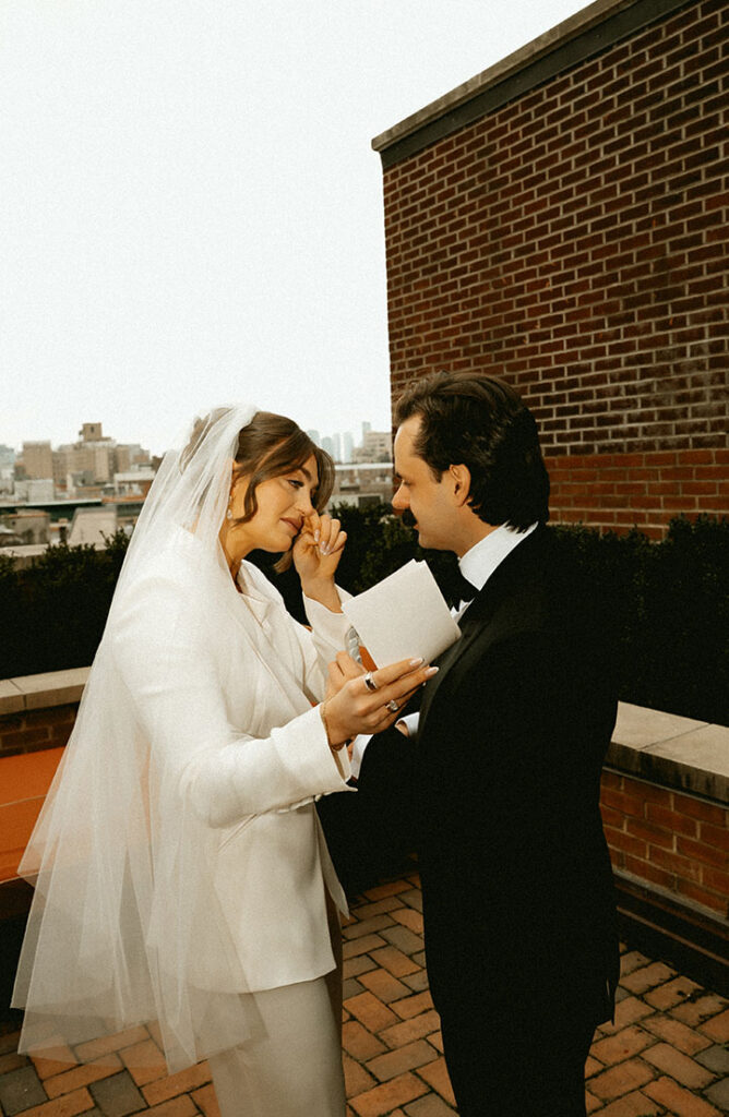 Editorial elopement portraits with NYC skyline in the background