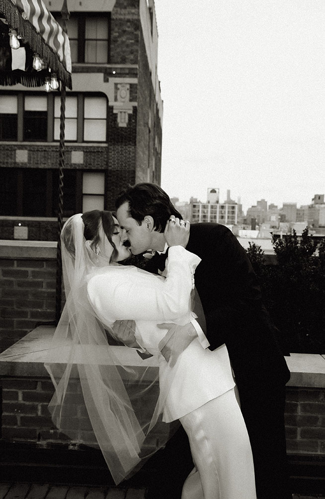Bride and groom Kissing after vows during an intimate New York City wedding at the Bowery Hotel