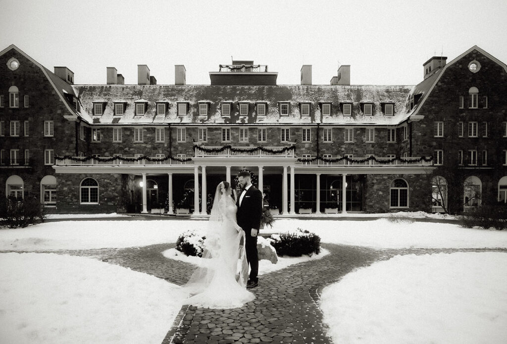 Exterior of Skytop Lodge stone architecture during a romantic winter wedding