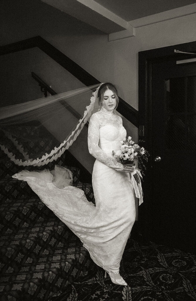 BW Documentary bridal portrait inside Skytop Lodge featuring vintage lace wedding dress