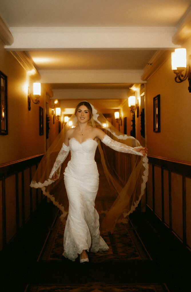Elegant bridal portrait highlighting vintage sleeves and lace textures
