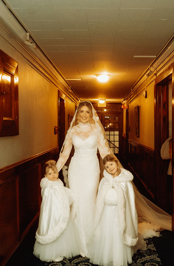 Bride with her two daughters at the Skytop Lodge hallway