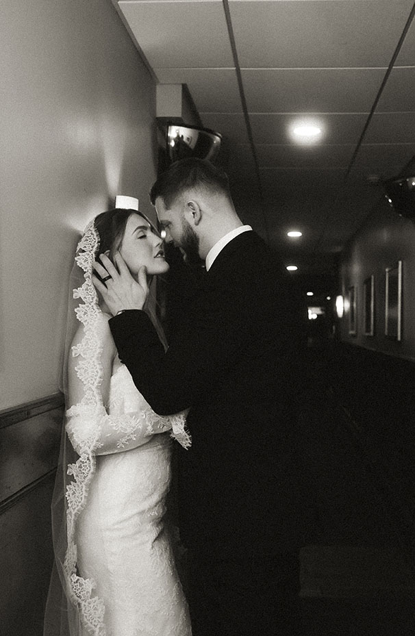 Bride and Groom at Skytop Lodge hallway about to kiss