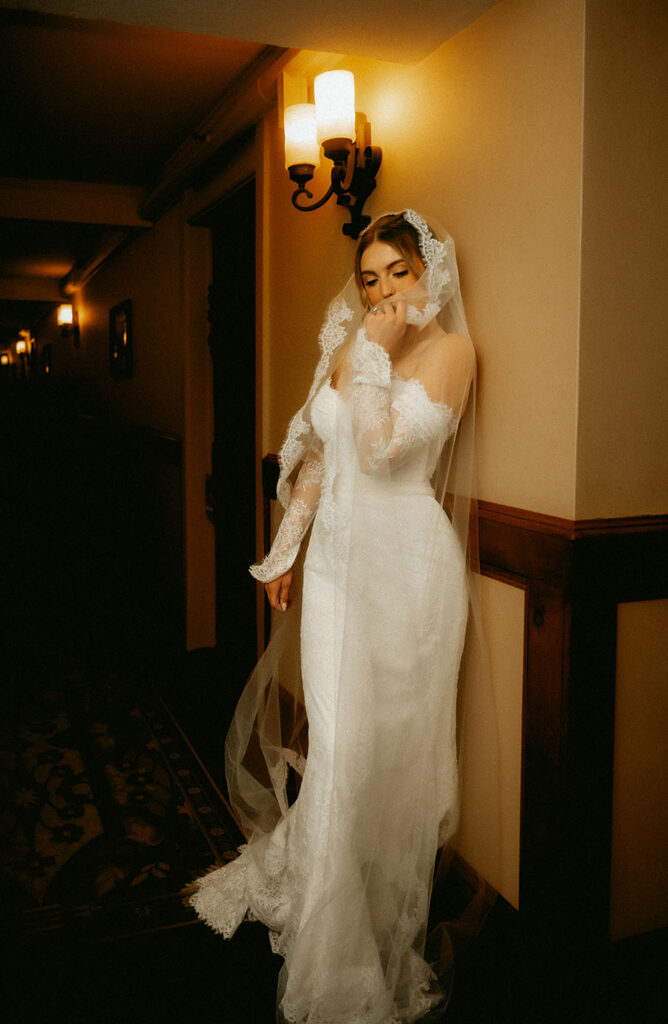 Bride with vintage long wedding gown at the Skytop Lodge