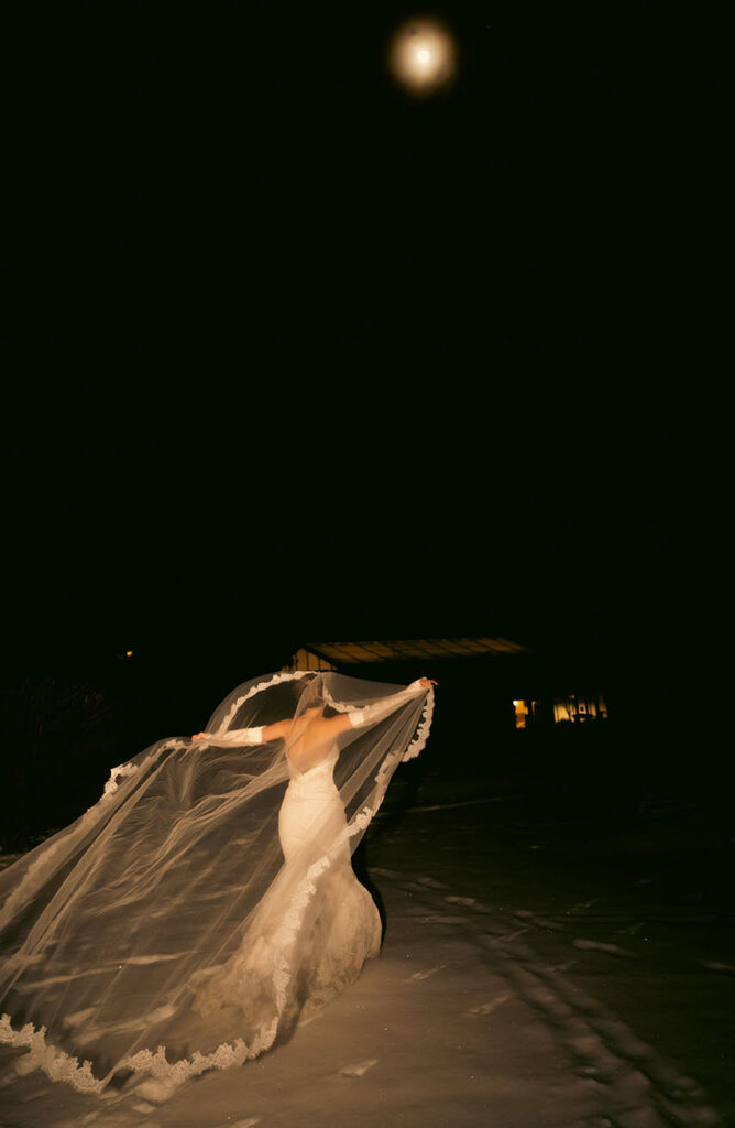 Nighttime wedding portraits under full moon in the Pocono Mountains