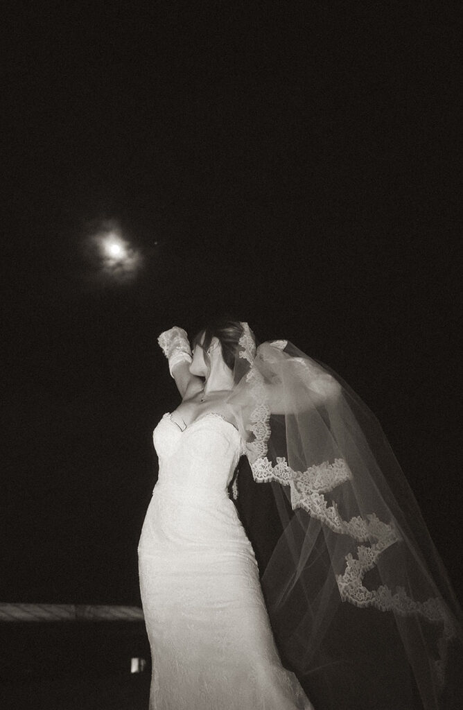 Atmospheric wedding photo with moonlight at historic mountain lodge