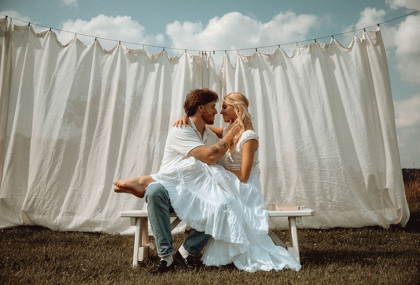 Cinematic engagement photos in Pittsburgh combining architecture and nature during romantic summer couple session