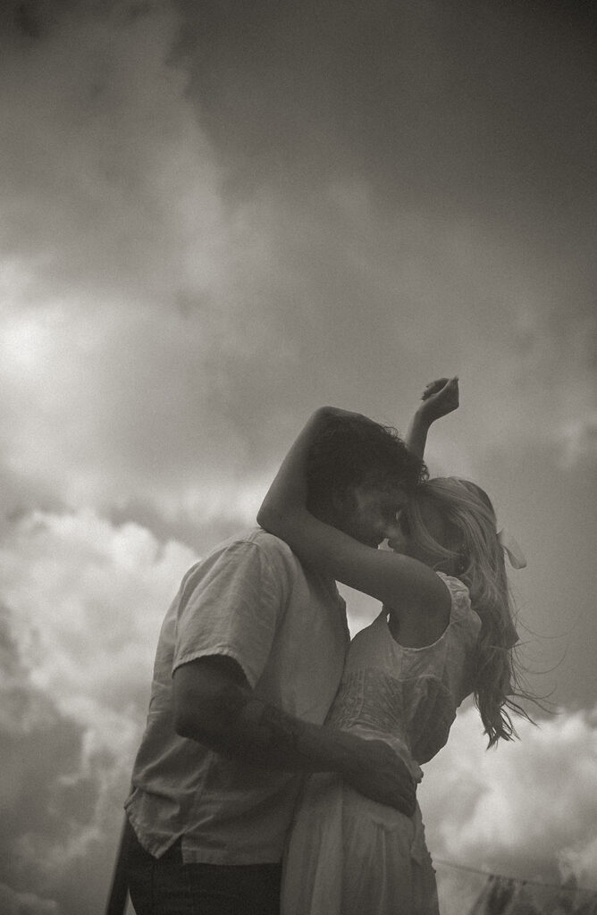 Natural candid engagement photography in Pittsburgh capturing authentic connection during romantic outdoor date