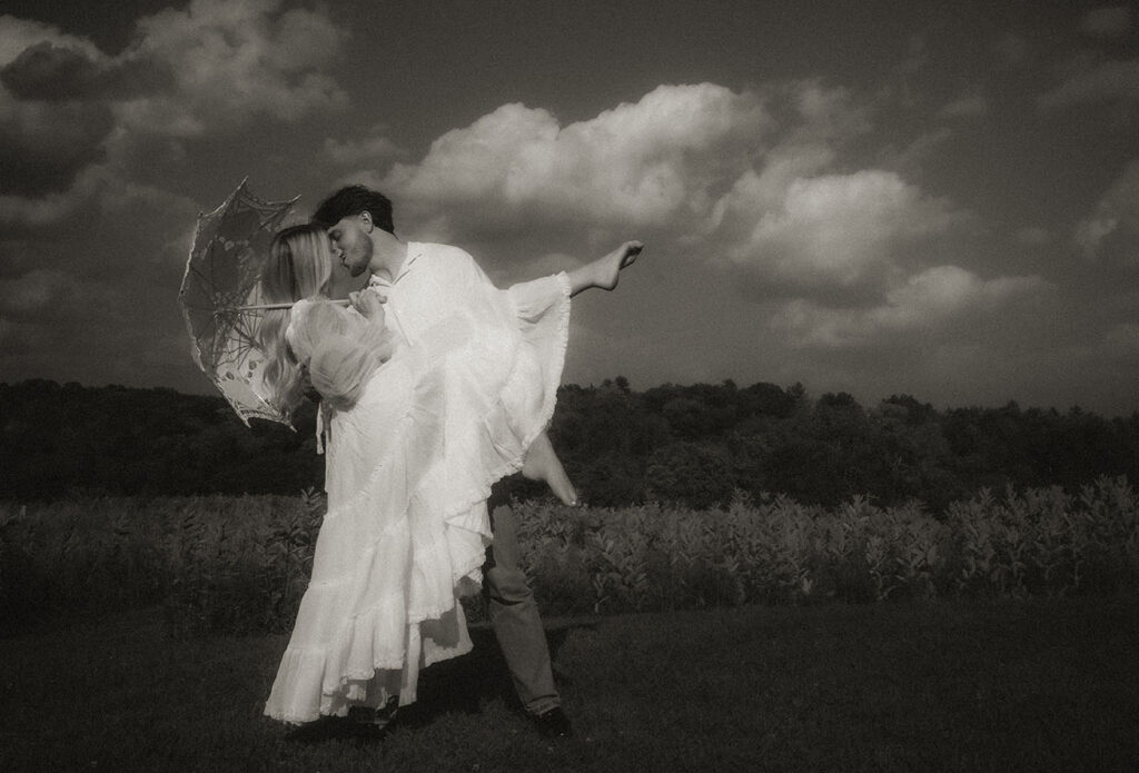 BW Emotional engagement session in Pittsburgh with natural movement and connection captured during romantic summer photos