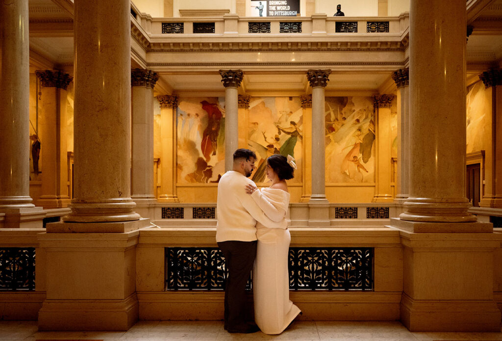 Couple during engagement at Carnegie Museum of Art in Pittsburgh.