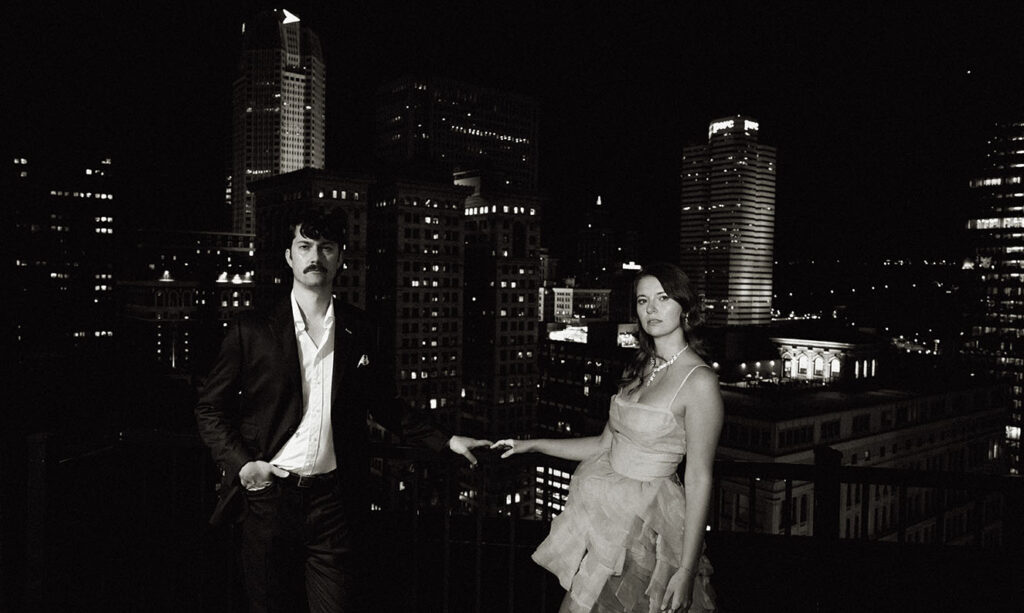 Romantic night engagement photos with downtown Pittsburgh in the background