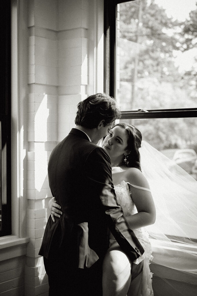 Groom holding bride at their editorial style wedding in pittsburgh