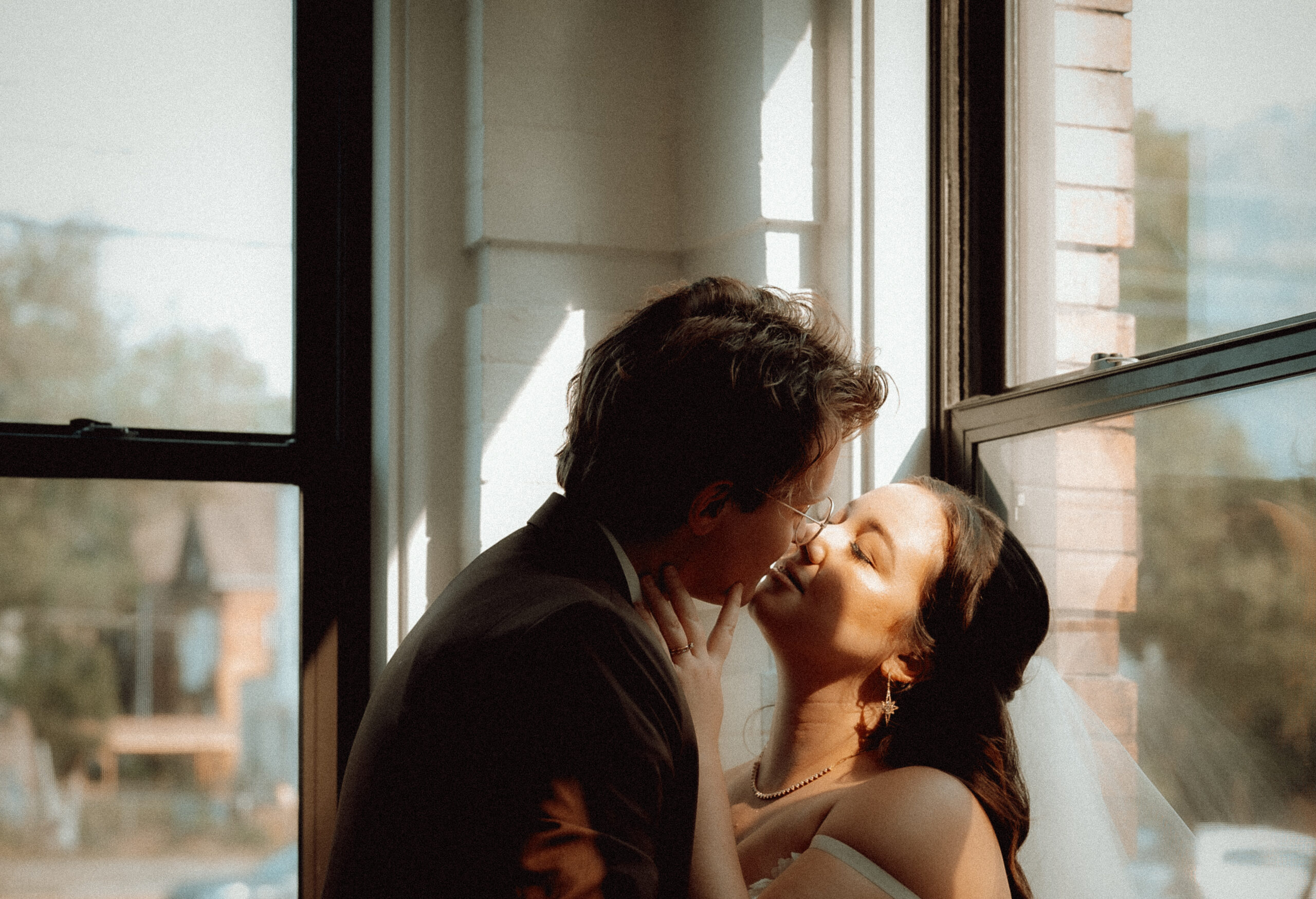 couple about to kiss on wedding day Pittsburgh documentary photography
