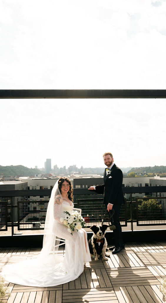 Documentary engagement session with dog capturing authentic laughter and natural interaction