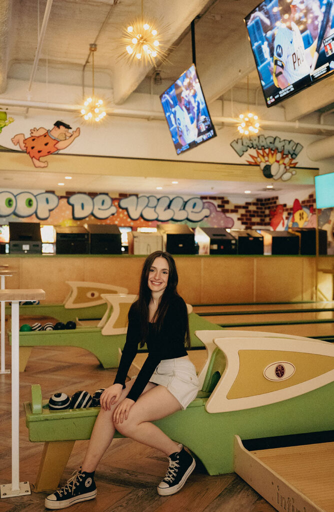 Downtown Pittsburgh senior photos with editorial flash and city architecture