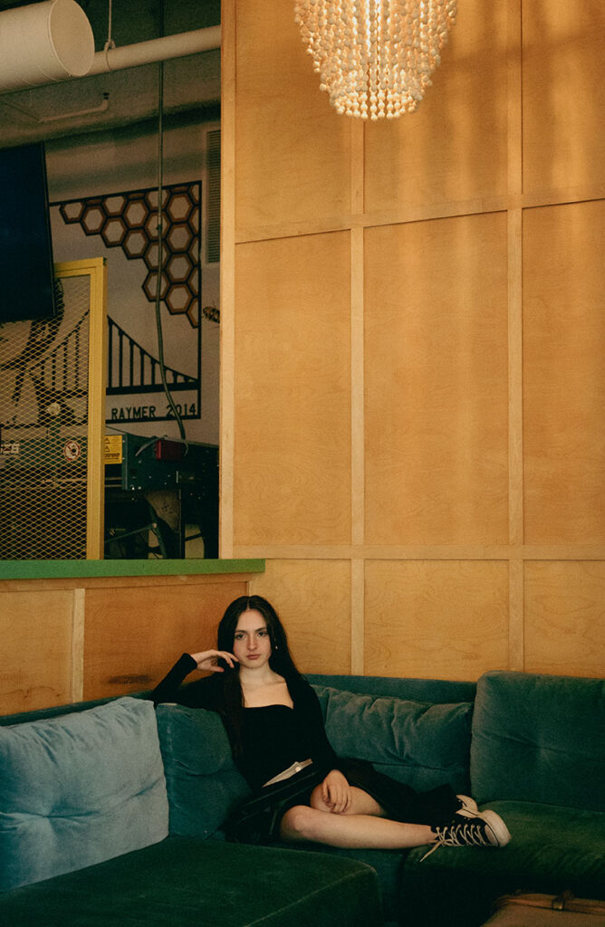 Editorial senior session in the Strip District Pittsburgh with movement and light