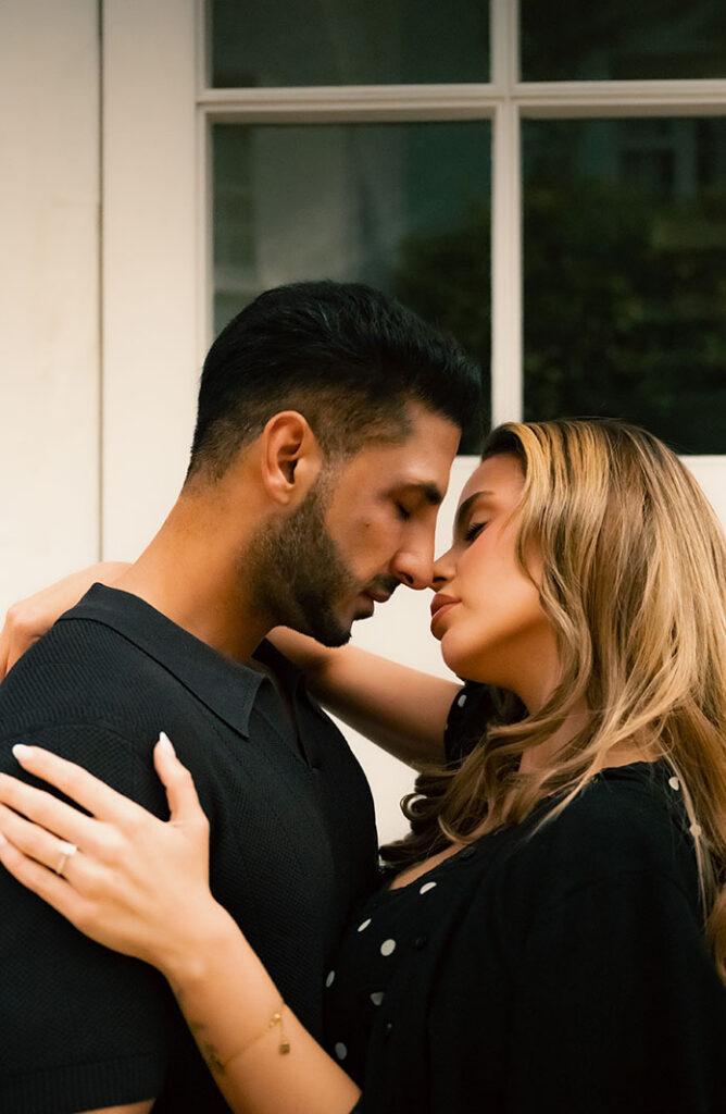 Couple about to kiss during engagement in London
