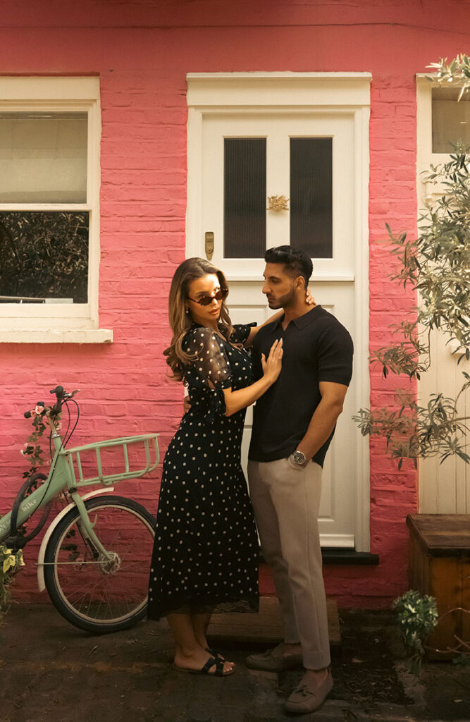 Couple in front of Bike during romantic editorial photo session in Notting Hill