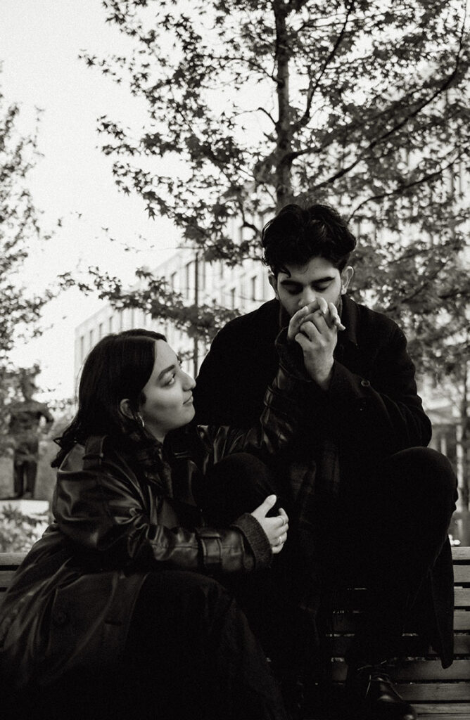 Romantic couple walking through Mayfair streets in London