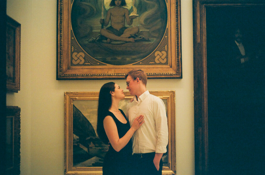 film engagement photos Pittsburgh couple in Carnegie Museum of Art soft grain