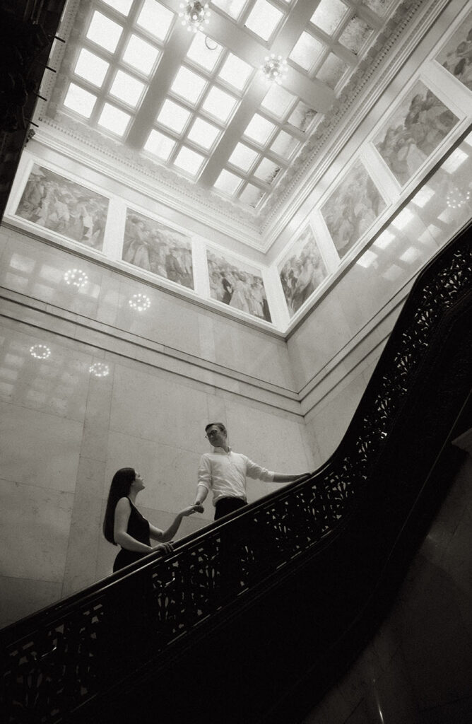 BW Couple Going up the elevator at Carnegie Museum of Art