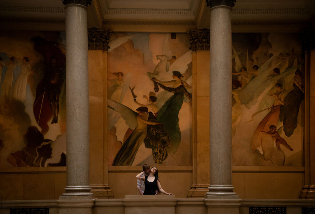 romantic couple standing at Carnegie Museum of Art during Pittsburgh engagement session