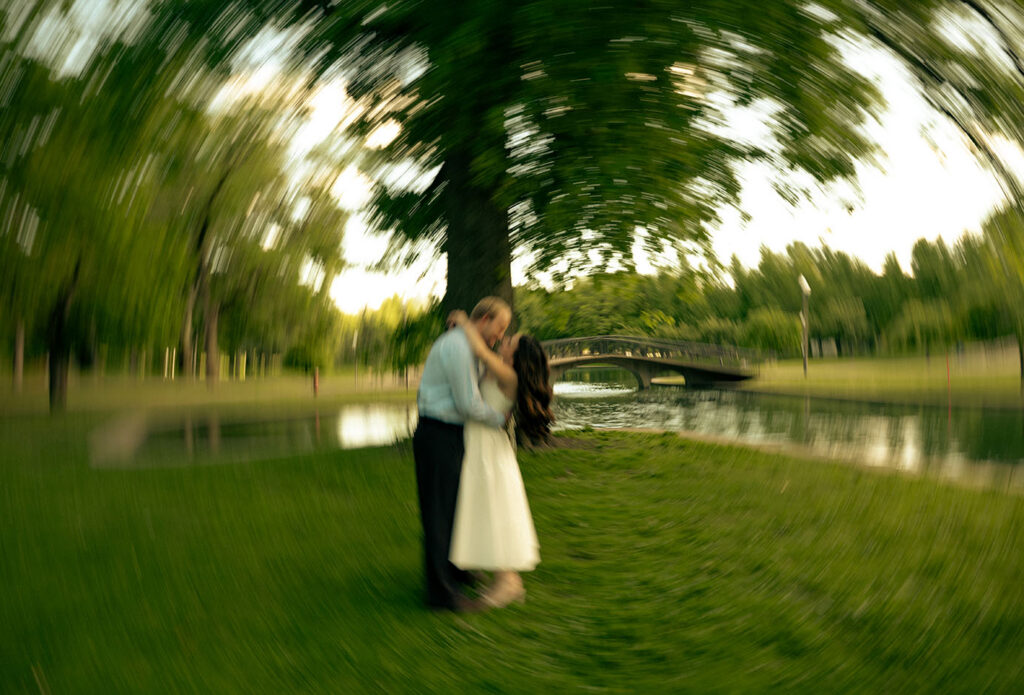 Couple holding hands in Allegheny Commons Park