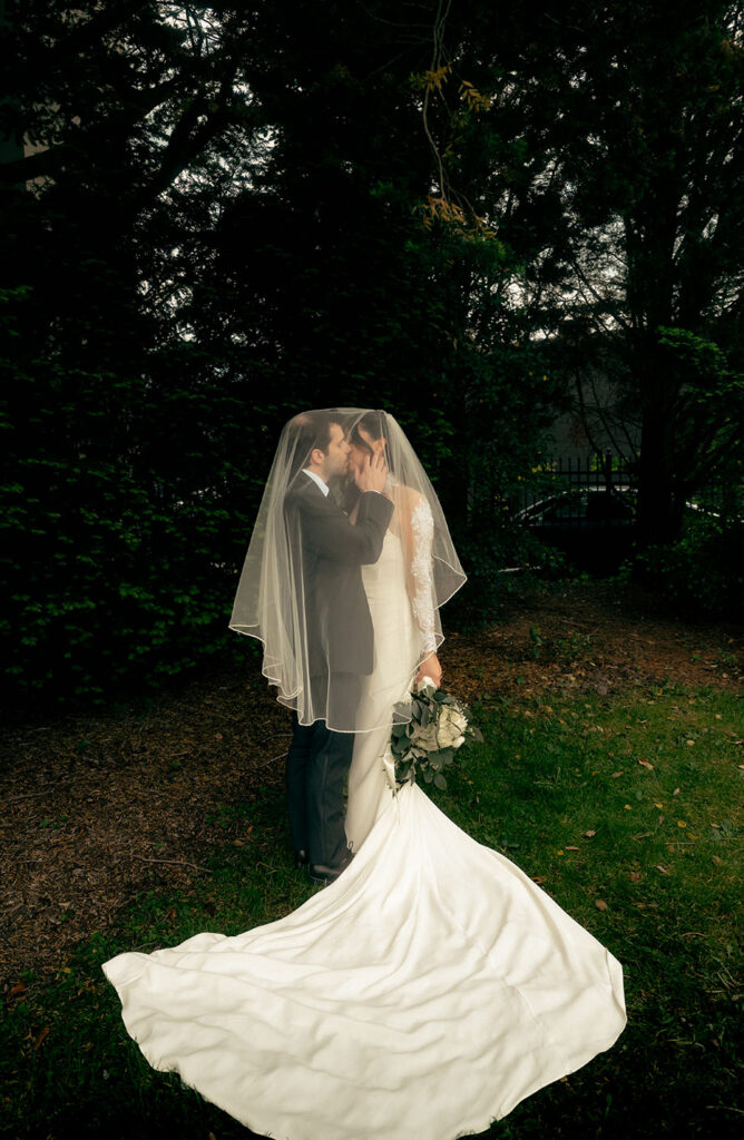 Bride wearing a timeless lace wedding dress during luxury wedding portraits.