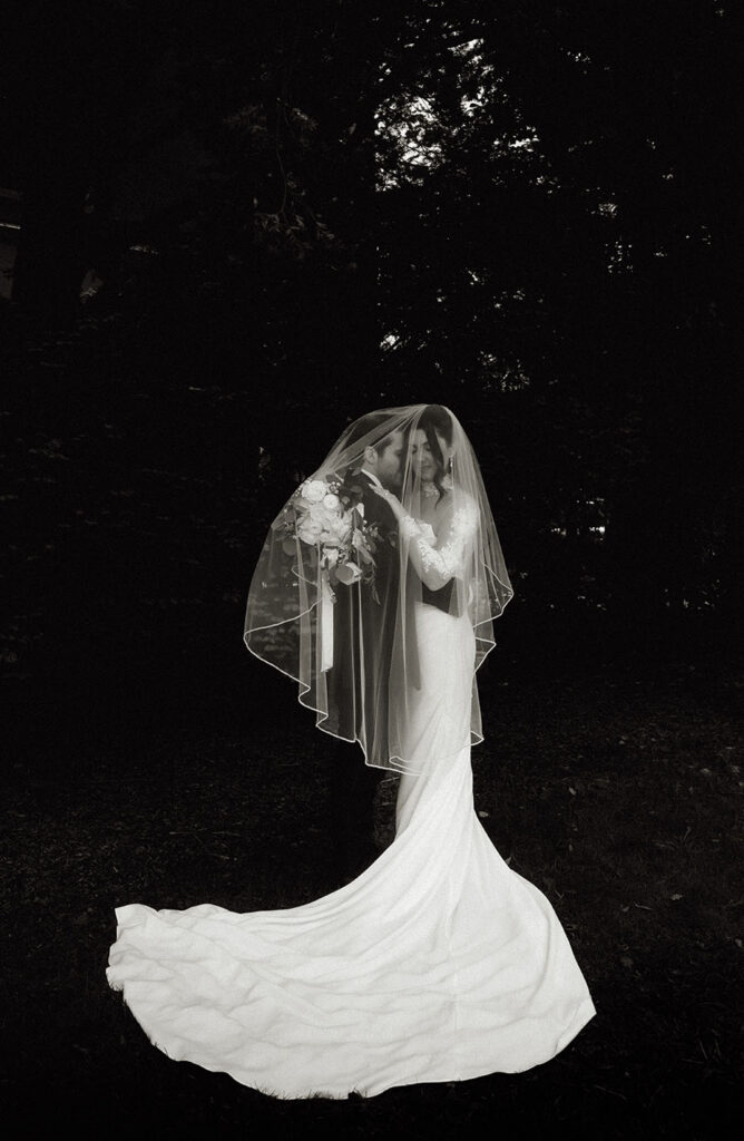 Editorial wedding portrait showcasing a sophisticated bridal look.