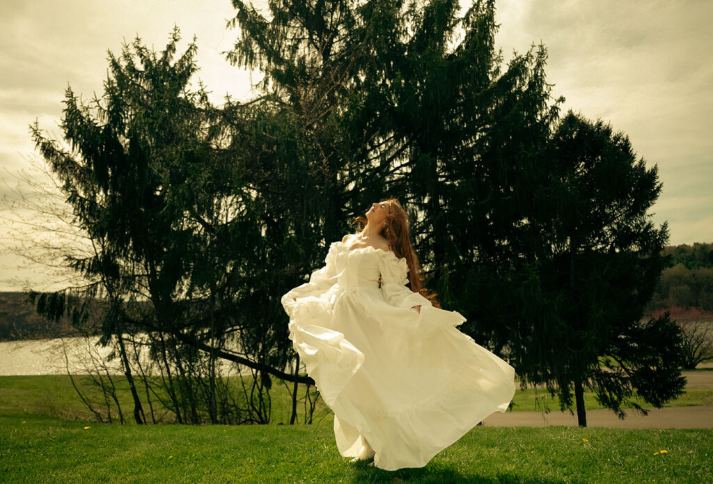 Woman wearing a flowing dress during Pittsburgh engagement photos.