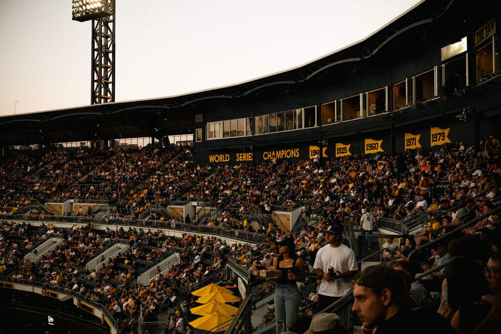 Couple enjoying a date night at PNC Park in Pittsburgh