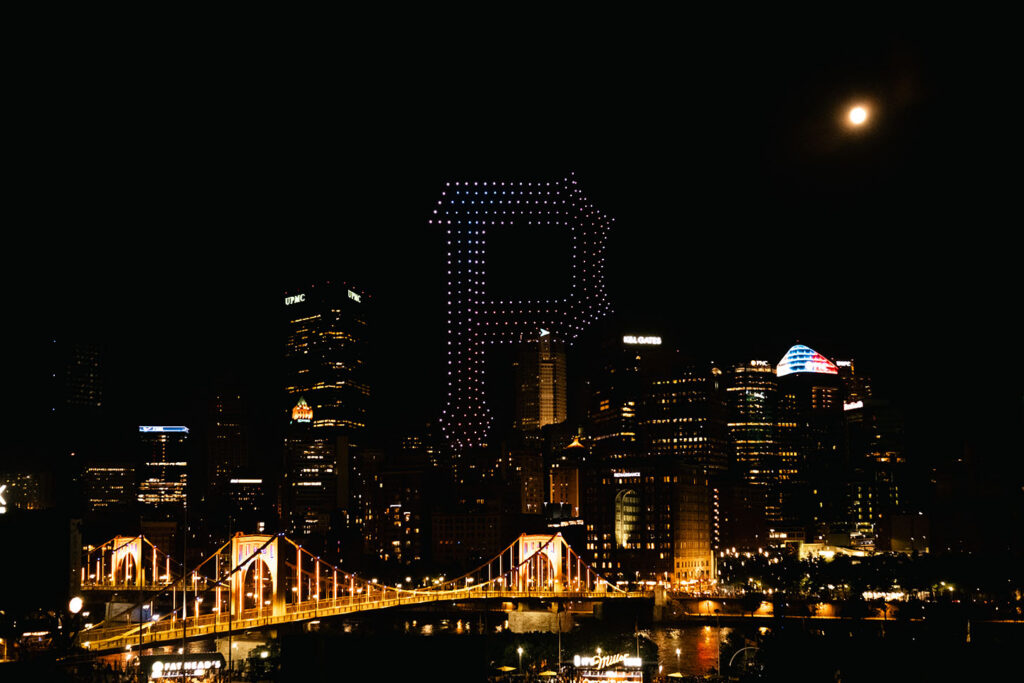 Summer evening at a Pittsburgh Pirates game with city skyline views