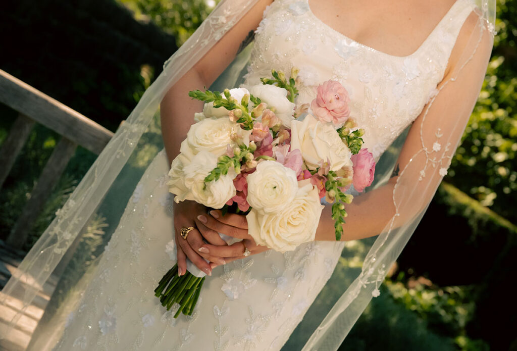 Bride holding bouquet at Phipps conservatory